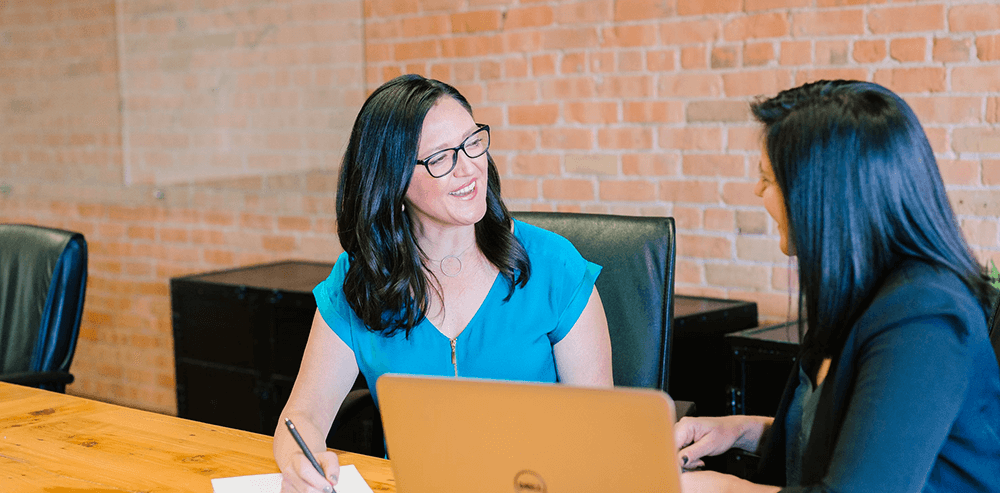 Two women talking about becoming an Academic Software partner